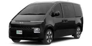 Le Hyundai Staria stationné en vue latérale, parfait pour la location de minivan premium au Costa Rica